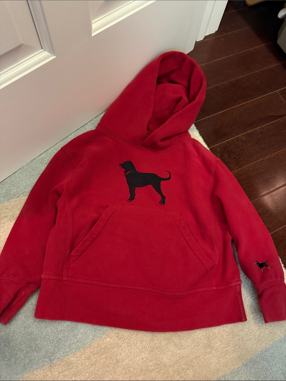 The Black Dog Red Hoodie with Black Dog Silhouette